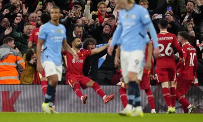 Liverpool's Mohamed Salah celebrates scoring during an English Premier League soccer match against Manchester City at Anfield Stadium, Liverpool, England, Sunday Dec. 1, 2024. (Peter Byrne/PA via AP)