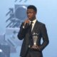 Vinicius Junior of Real Madrid talks after being awarded as the Best Men's FIFA Player during the FIFA Football Awards 2024 in Doha, Qatar, Tuesday, Dec. 17, 2024. (AP Photo/Hussein Sayed)