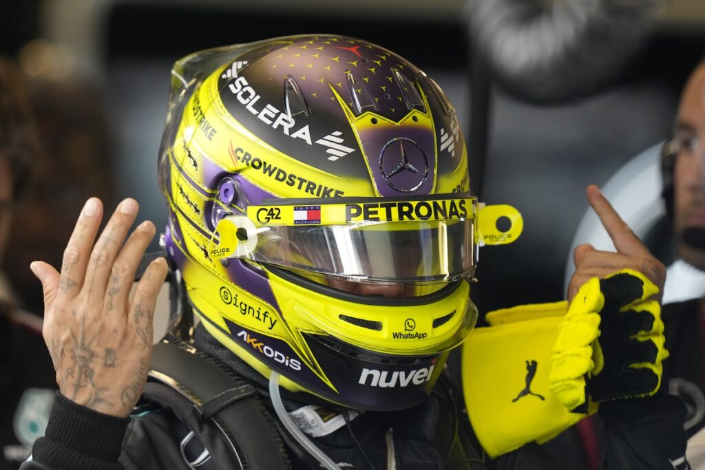 Mercedes driver Lewis Hamilton of Britain gets ready for the Formula One Abu Dhabi Grand Prix at the Yas Marina Circuit in Abu Dhabi, UAE, Sunday, Dec. 8, 2024. (AP Photo/Darko Bandic)