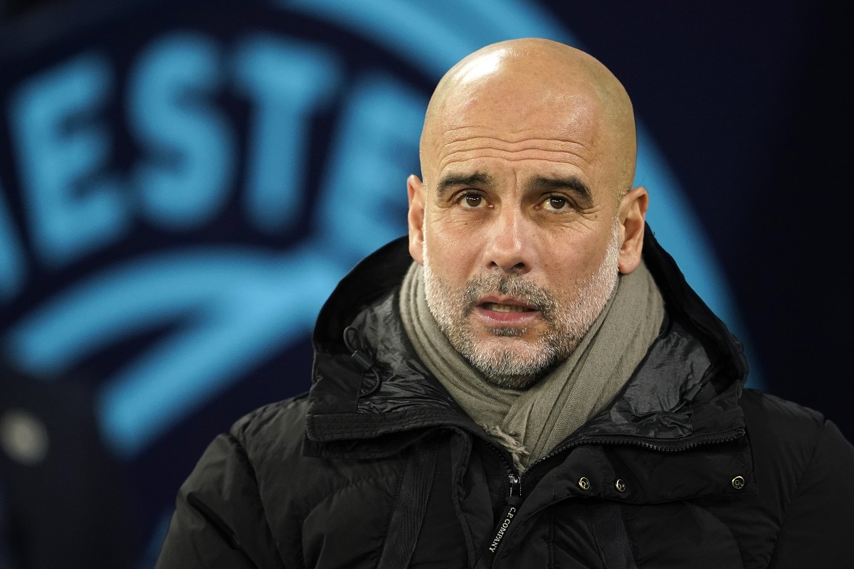 Manchester City's head coach Pep Guardiola ahead the English FA Cup soccer match between Manchester City and Salford City at Etihad Stadium in Manchester, Saturday, Jan. 11, 2025. (AP Photo/ Dave Thompson)