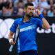 Novak Djokovic of Serbia gestures during his third round match against Tomas Machac of the Czech Republic at the Australian Open tennis championship in Melbourne, Australia, Friday, Jan. 17, 2025. (AP Photo/Asanka Brendon Ratnayake)