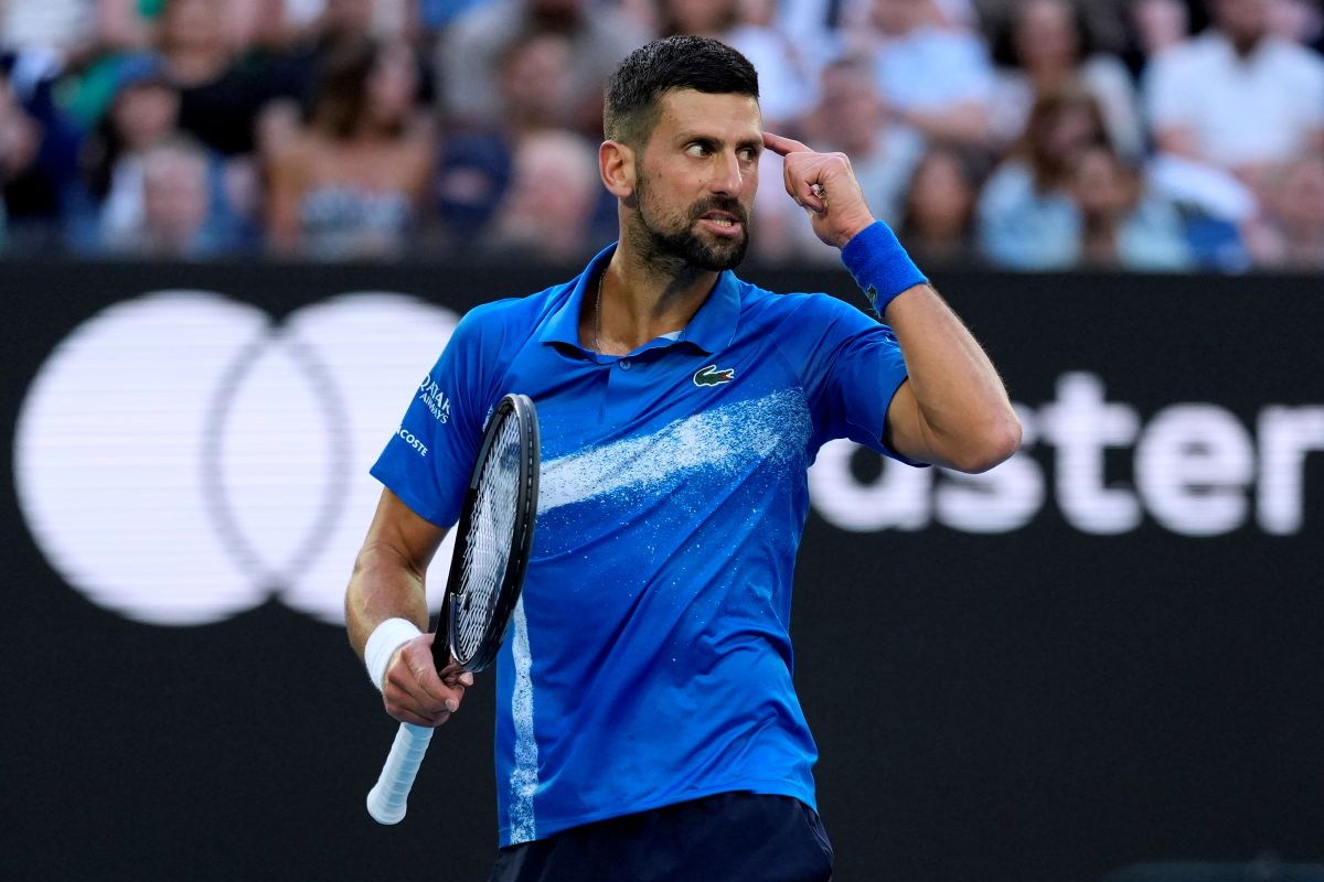 Novak Djokovic of Serbia gestures during his third round match against Tomas Machac of the Czech Republic at the Australian Open tennis championship in Melbourne, Australia, Friday, Jan. 17, 2025. (AP Photo/Asanka Brendon Ratnayake)