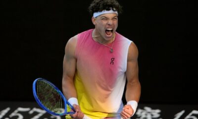 Ben Shelton of the U.S. reacts during his quarterfinal match against Lorenzo Sonego of Italy at the Australian Open tennis championship in Melbourne, Australia, Wednesday, Jan. 22, 2025. (AP Photo/Asanka Brendon Ratnayake)