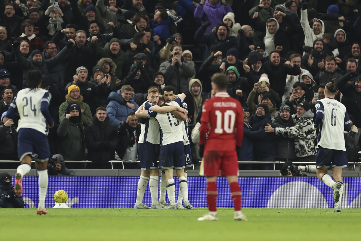 Tottenham's Dominic Solanke celebrates with teammates after scores a disallowed goal during the English League Cup semi final first leg soccer match between Tottenham and Liverpool, at the Tottenham Hotspur Stadium in London, Wednesday, Jan. 8, 2025. (AP Photo/Ian Walton)