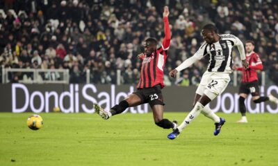 Juventus' Timothy Weah, right, scores during the Italian Serie A soccer match between Juventus and AC Milan at the Allianz Stadium in Turin, Italy, Saturday, Jan. 18, 2025. (Marco Alpozzi/LaPresse via AP)