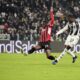 Juventus' Timothy Weah, right, scores during the Italian Serie A soccer match between Juventus and AC Milan at the Allianz Stadium in Turin, Italy, Saturday, Jan. 18, 2025. (Marco Alpozzi/LaPresse via AP)