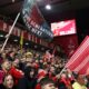 Nottingham Forest fans support their team prior the English Premier League soccer match between Nottingham Forest and Liverpool at the City Ground stadium in Nottingham, England, Tuesday, Jan. 14, 2025. (AP Photo/Darren Staples)