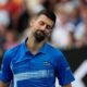 Novak Djokovic of Serbia reacts during a fourth round match against Jiri Lehecka of the Czech Republic at the Australian Open tennis championship in Melbourne, Australia, Sunday, Jan. 19, 2025. (AP Photo/Asanka Brendon Ratnayake)