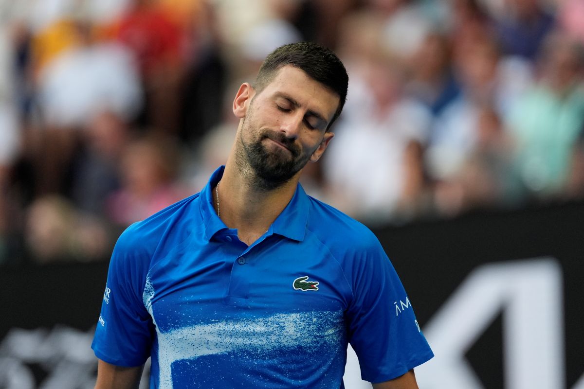 Novak Djokovic of Serbia reacts during a fourth round match against Jiri Lehecka of the Czech Republic at the Australian Open tennis championship in Melbourne, Australia, Sunday, Jan. 19, 2025. (AP Photo/Asanka Brendon Ratnayake)