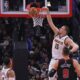 Denver Nuggets center Nikola Jokic (15) slam-dunks during the first half of an NBA basketball game against the Chicago Bulls, Monday, Jan. 27, 2025, in Chicago. (AP Photo/Melissa Tamez)