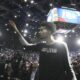 San Antonio Spurs center Victor Wembanyama (1) waves to fans as he leaves the court following a Paris Games 2025 NBA basketball game against the Indiana Pacers in Paris, Saturday, Jan. 25, 2025. (AP Photo/Thibault Camus)