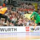 Hungary's Zoran Ilic, right, scores a goal during the quarterfinal match between Croatia and Hungary at the Handball Men's World Championships in Zagreb, Croatia, Tuesday, Jan. 28, 2025. (AP Photo/Darko Bandic)