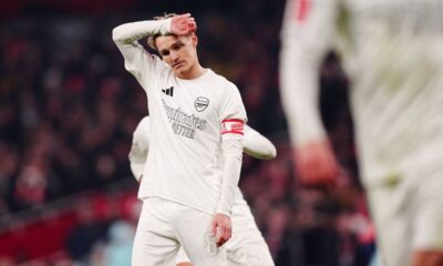 Arsenal's Martin Odegaard reacts after his penalty is saved by Manchester United goalkeeper Altay Bayindir during the English FA Cup soccer match between Arsenal and Manchester United at the Emirates stadium in London, Sunday, Jan. 12, 2025.(Mike Egerton/PA via AP)