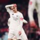 Arsenal's Martin Odegaard reacts after his penalty is saved by Manchester United goalkeeper Altay Bayindir during the English FA Cup soccer match between Arsenal and Manchester United at the Emirates stadium in London, Sunday, Jan. 12, 2025.(Mike Egerton/PA via AP)