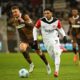 t. Pauli's Hauke Wahl, left and Frankfurt's Omar Marmoush vie for the ball, during the German Bundesliga soccer match between FC St. Pauli and Eintracht Frankfurt, in Hamburg, Germany, Saturday, Jan. 11, 2025. (Gregor Fischer/dpa via AP)