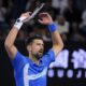 Novak Djokovic of Serbia gestures to the crowd during his quarterfinal match against Carlos Alcaraz of Spain at the Australian Open tennis championship in Melbourne, Australia, Wednesday, Jan. 22, 2025. (AP Photo/Vincent Thian)