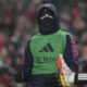 Manchester United's Alejandro Garnacho warms up prior to the English Premier League soccer match against Liverpool at the Anfield stadium in Liverpool, England, Sunday, Jan. 5, 2025. (AP Photo/Jon Super)