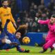 Chelsea's Marc Cucurella, left, scores his side's second goal during the English Premier League soccer match between Chelsea and Wolverhampton at Stamford Bridge stadium in London, Monday, Jan. 20, 2025. (AP Photo/Kin Cheung)