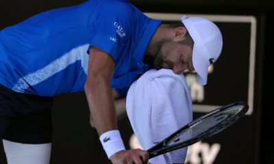 Novak Djokovic of Serbia reacts during his semifinal match against Alexander Zverev of Germany at the Australian Open tennis championship in Melbourne, Australia, Friday, Jan. 24, 2025. (AP Photo/Manish Swarup)