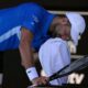 Novak Djokovic of Serbia reacts during his semifinal match against Alexander Zverev of Germany at the Australian Open tennis championship in Melbourne, Australia, Friday, Jan. 24, 2025. (AP Photo/Manish Swarup)