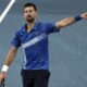 Novak Djokovic of Serbia gestures during his quarterfinal match against Carlos Alcaraz of Spain at the Australian Open tennis championship in Melbourne, Australia, Tuesday, Jan. 21, 2025. (AP Photo/Ng Han Guan)