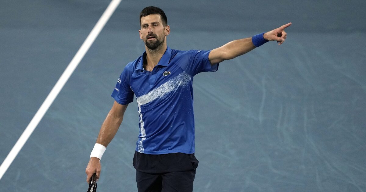 Novak Djokovic of Serbia gestures during his quarterfinal match against Carlos Alcaraz of Spain at the Australian Open tennis championship in Melbourne, Australia, Tuesday, Jan. 21, 2025. (AP Photo/Ng Han Guan)