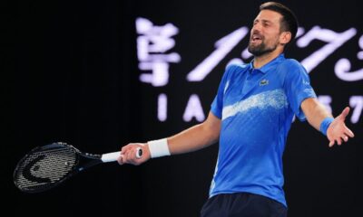 Serbia's Novak Djokovic gestures during an exhibition match against Germany's Alexander Zverev ahead of the Australian Open tennis championship in Melbourne, Australia, Thursday, Jan. 9, 2025. (AP Photo/Vincent Thian)