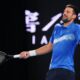 Serbia's Novak Djokovic gestures during an exhibition match against Germany's Alexander Zverev ahead of the Australian Open tennis championship in Melbourne, Australia, Thursday, Jan. 9, 2025. (AP Photo/Vincent Thian)