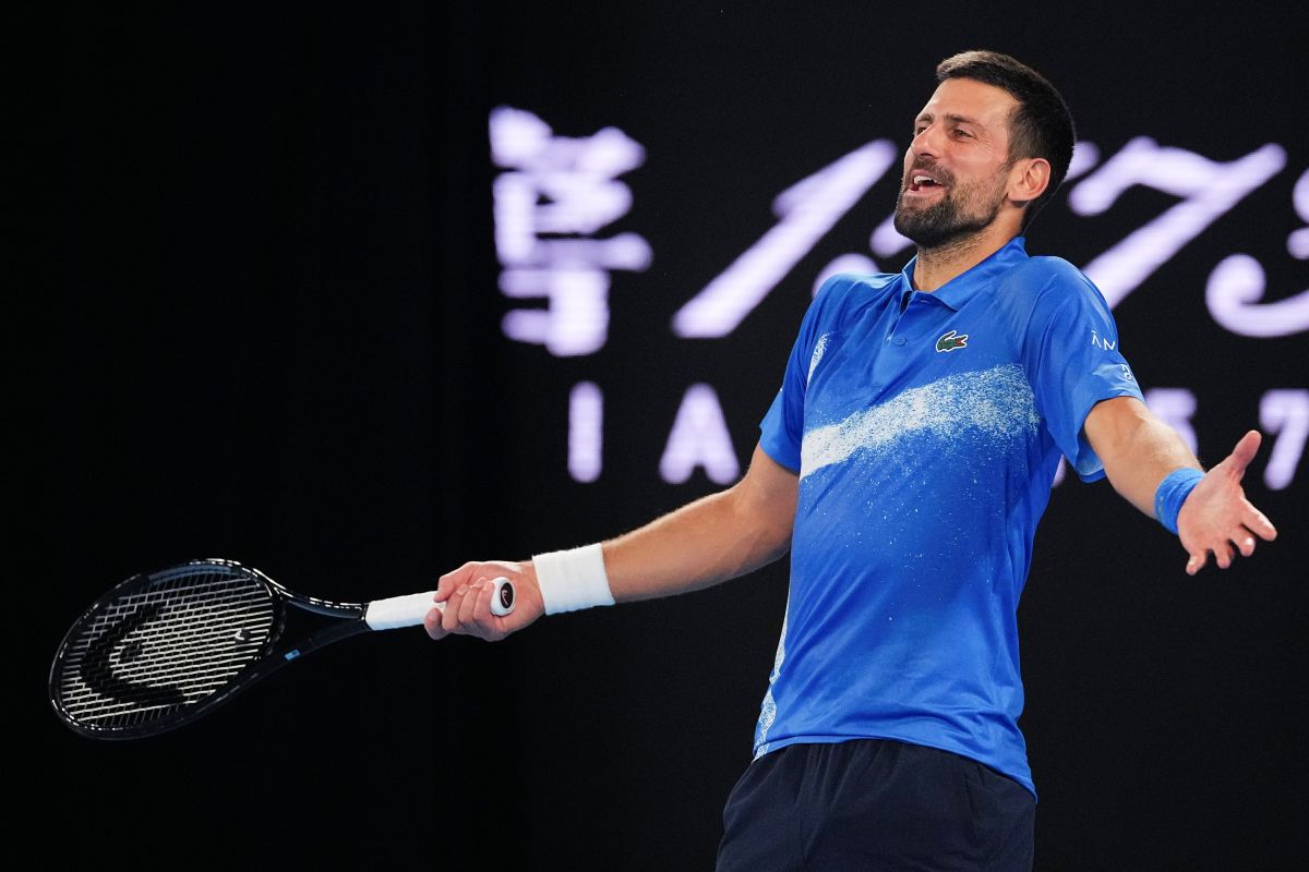 Serbia's Novak Djokovic gestures during an exhibition match against Germany's Alexander Zverev ahead of the Australian Open tennis championship in Melbourne, Australia, Thursday, Jan. 9, 2025. (AP Photo/Vincent Thian)