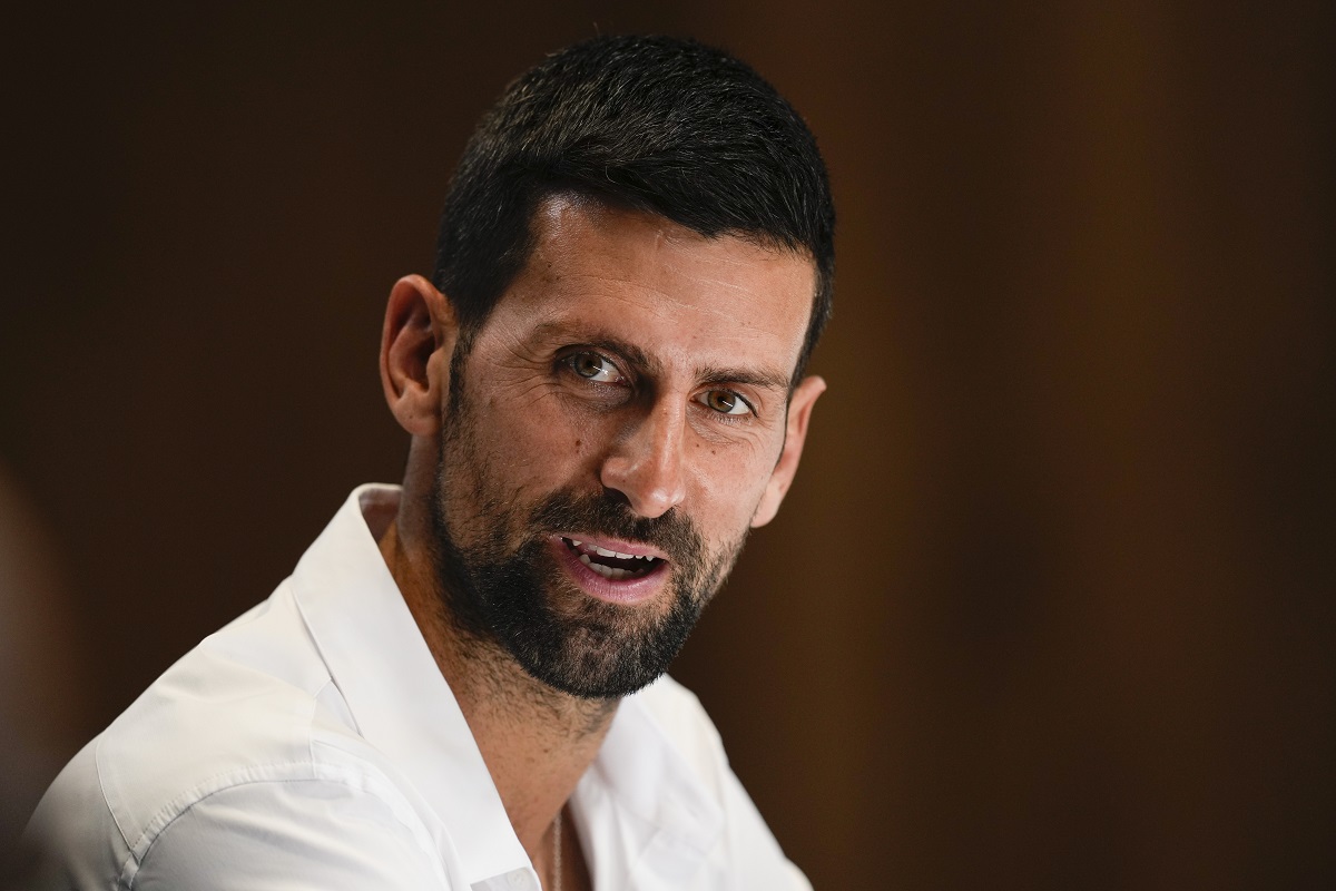 Serbia's Novak Djokovic reacts during a press conference ahead of the Australian Open tennis championship in Melbourne, Australia, Friday, Jan. 10, 2025. (AP Photo/Ng Han Guan)