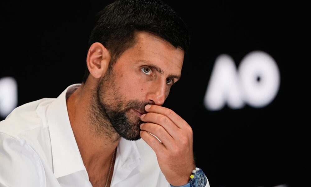 Serbia's Novak Djokovic reacts during a press conference ahead of the Australian Open tennis championship in Melbourne, Australia, Friday, Jan. 10, 2025. (AP Photo/Ng Han Guan)