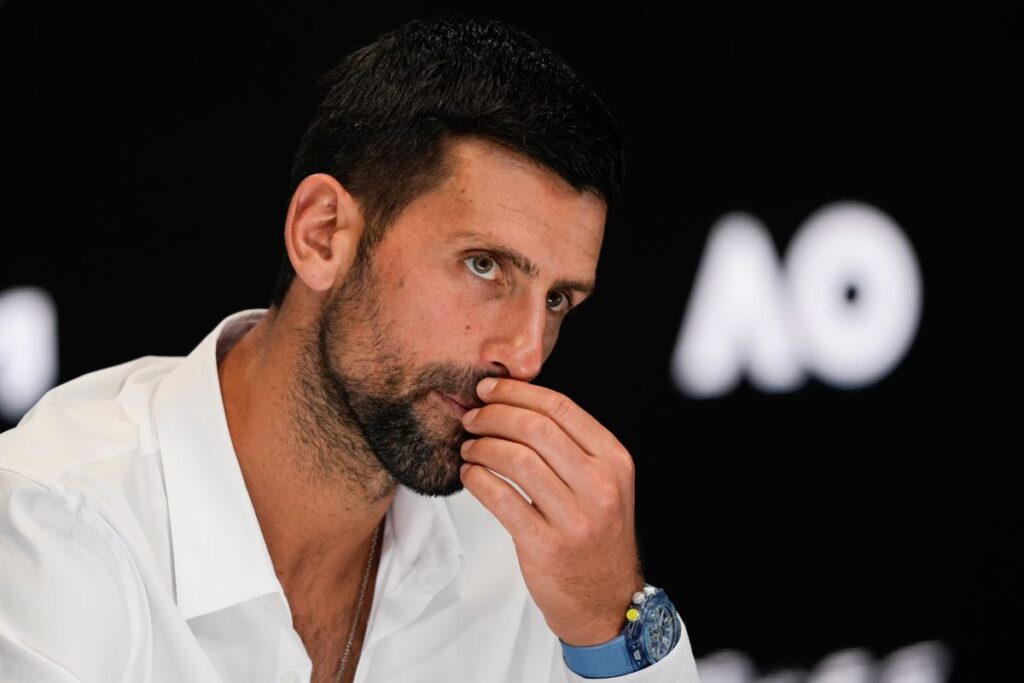 Serbia's Novak Djokovic reacts during a press conference ahead of the Australian Open tennis championship in Melbourne, Australia, Friday, Jan. 10, 2025. (AP Photo/Ng Han Guan)