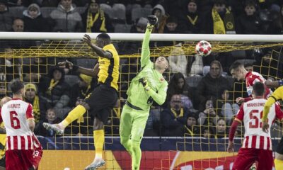 Red Star goalkeeper Ivan Gutesa, right, saves in front of Young Boys' Silvere Ganvoula during the Champions League opening phase soccer match between BSC Young Boys and (Red Star Belgrade at the Wankdorf Stadium in Bern, Switzerland, Wednesday, Jan. 29, 2025. (Alessandro della Valle/Keystone via AP)