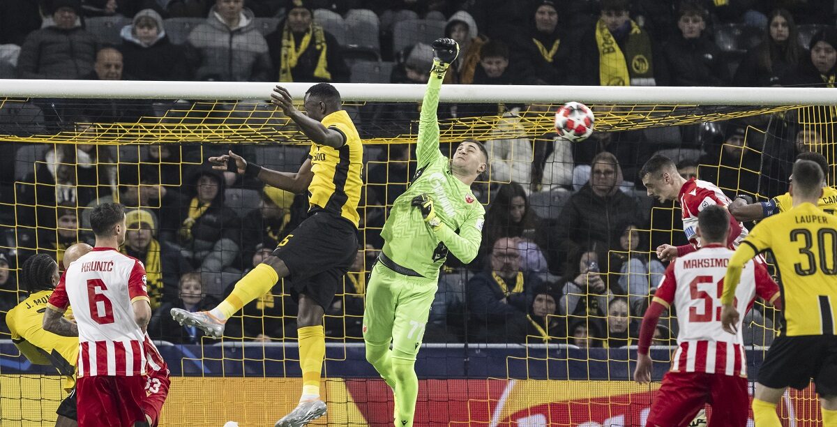 Red Star goalkeeper Ivan Gutesa, right, saves in front of Young Boys' Silvere Ganvoula during the Champions League opening phase soccer match between BSC Young Boys and (Red Star Belgrade at the Wankdorf Stadium in Bern, Switzerland, Wednesday, Jan. 29, 2025. (Alessandro della Valle/Keystone via AP)