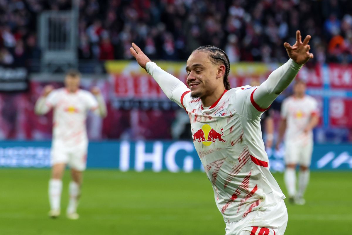 Leipzig's Xavi Simons celebrates after scoring a goal, during the German Bundesliga soccer match between RB Leipzig and SV Werder Bremen, in Leipzig, Germany, Sunday, Jan. 12, 2025. (Jan Woitas/dpa via AP)