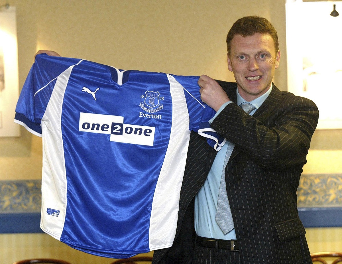 FILE - David Moyes smiles as he is presented as Everton manager, in Liverpool, England, March 14, 2002. (Martin Rickett/PA via AP, File)