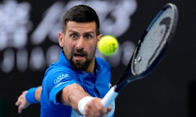 Novak Djokovic of Serbia reacts during a fourth round match against Jiri Lehecka of the Czech Republic at the Australian Open tennis championship in Melbourne, Australia, Sunday, Jan. 19, 2025. (AP Photo/Asanka Brendon Ratnayake)