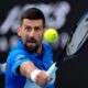 Novak Djokovic of Serbia reacts during a fourth round match against Jiri Lehecka of the Czech Republic at the Australian Open tennis championship in Melbourne, Australia, Sunday, Jan. 19, 2025. (AP Photo/Asanka Brendon Ratnayake)