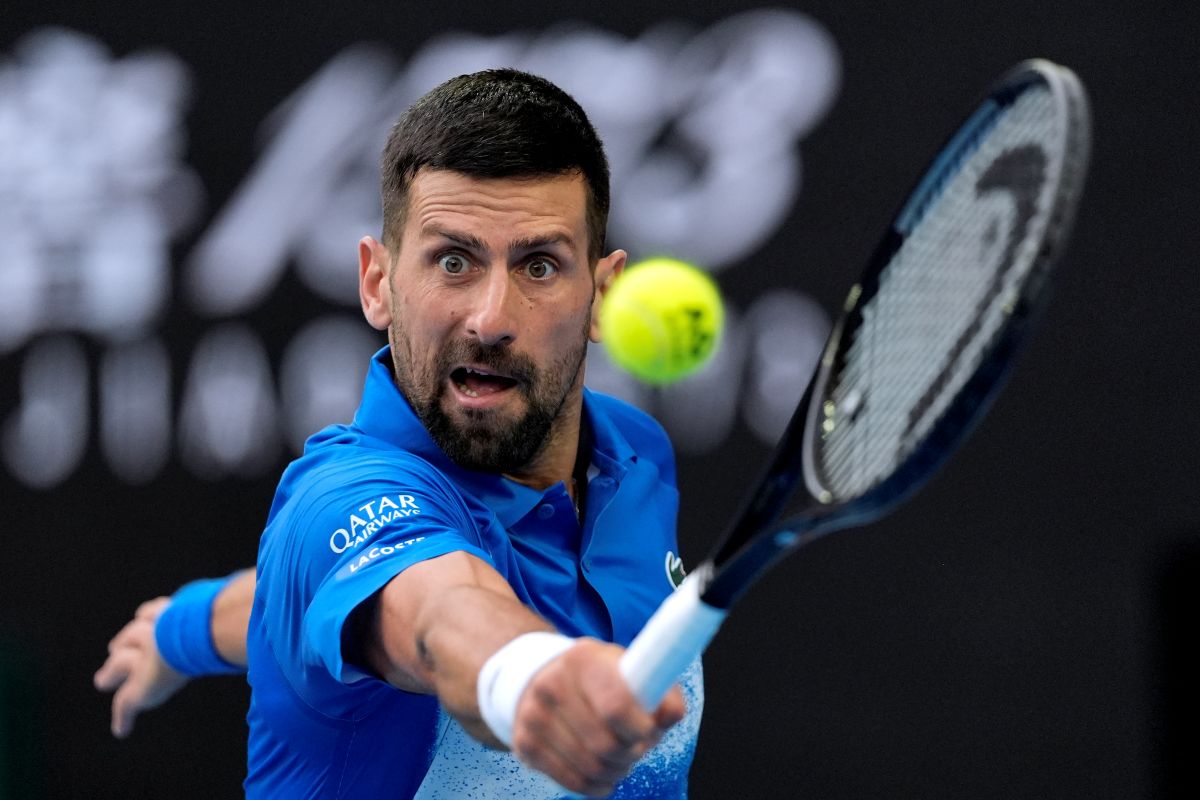 Novak Djokovic of Serbia reacts during a fourth round match against Jiri Lehecka of the Czech Republic at the Australian Open tennis championship in Melbourne, Australia, Sunday, Jan. 19, 2025. (AP Photo/Asanka Brendon Ratnayake)