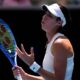 Olga Danilovic of Serbia reacts during a fourth round match against Paula Badosa of Spain at the Australian Open tennis championship in Melbourne, Australia, Sunday, Jan. 19, 2025. (AP Photo/Vincent Thian)