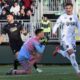 Empoli's Sebastiano Esposito, right, celebrates after scoring his side's first goal of the game during the Serie A soccer match between Venezia and Empoli at the Pier Luigi Penzo Stadium, in Venice, Italy, Saturday Jan. 4, 2025. (Paola Garbuio/LaPresse via AP)