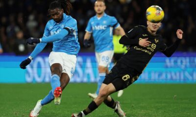 Napoli's Andre-Frank Zambo Anguissa kicks the ball, during the Italian Serie A soccer match between Napoli and Venezia at the Diego Armando Maradona Stadium in Naples, Italy, Sunday, Jan. 12, 2025. (Alessandro Garofalo/LaPresse via AP)