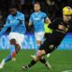 Napoli's Andre-Frank Zambo Anguissa kicks the ball, during the Italian Serie A soccer match between Napoli and Venezia at the Diego Armando Maradona Stadium in Naples, Italy, Sunday, Jan. 12, 2025. (Alessandro Garofalo/LaPresse via AP)