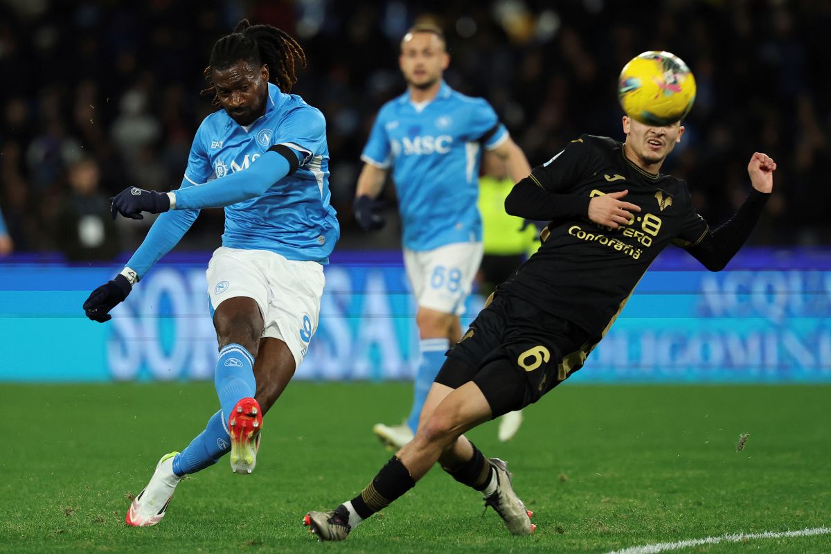 Napoli's Andre-Frank Zambo Anguissa kicks the ball, during the Italian Serie A soccer match between Napoli and Venezia at the Diego Armando Maradona Stadium in Naples, Italy, Sunday, Jan. 12, 2025. (Alessandro Garofalo/LaPresse via AP)