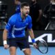 Novak Djokovic of Serbia celebrates after defeating Carlos Alcaraz of Spain in their quarterfinal match at the Australian Open tennis championship in Melbourne, Australia, Wednesday, Jan. 22, 2025. (AP Photo/Asanka Brendon Ratnayake)