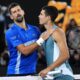 Novak Djokovic, left, of Serbia, is congratulated by Carlos Alcaraz of Spain following their quarterfinal match at the Australian Open tennis championship in Melbourne, Australia, Wednesday, Jan. 22, 2025. (AP Photo/Vincent Thian)