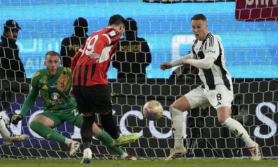 AC Milan's Theo Hernandez misses during the Italian Super Cup semifinal soccer match between Juventus and Milan in Riyadh, Saudi Arabia, Friday, Jan. 3, 2025. (AP Photo/Altaf Qadri)