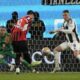 AC Milan's Theo Hernandez misses during the Italian Super Cup semifinal soccer match between Juventus and Milan in Riyadh, Saudi Arabia, Friday, Jan. 3, 2025. (AP Photo/Altaf Qadri)