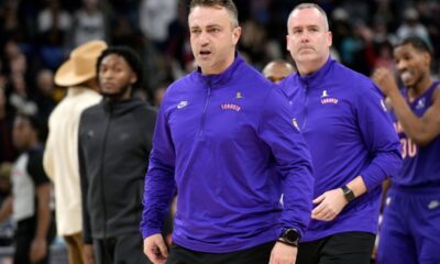 Toronto Raptors head coach Darko Rajakovic, center, walks off of the court after being ejected in the first half of an NBA basketball game against the Memphis Grizzlies, Thursday, Dec. 26, 2024, in Memphis, Tenn. (AP Photo/Brandon Dill)