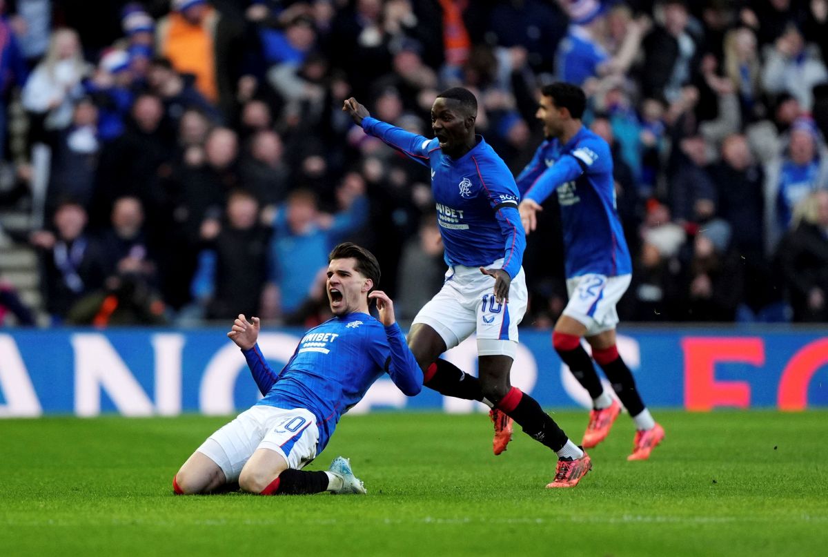 Rangers' Ianis Hagi celebrates scoring their side's first goal of the game during the Premiership match between Celtic and Rangers at Ibrox Stadium, in Glasgow, Scotland, Thursday Jan. 2, 2025. (Andrew Milligan/PA via AP)